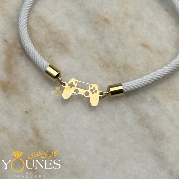 دستبند دسته بازی پلیستیشن طلا لیزری